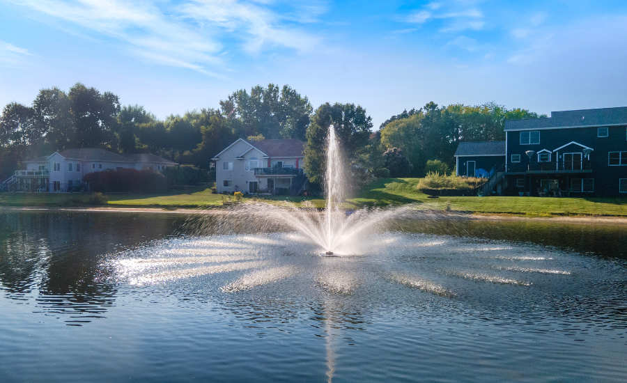 Pond Fountain In A Neighborhood