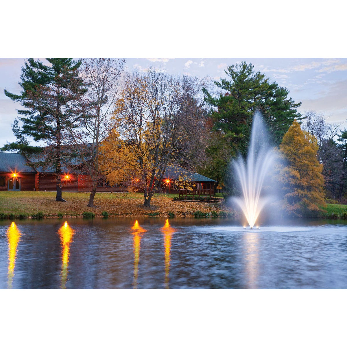 Scott Aerator Amherst Pond Fountain Lighted At Dusk In A Beautiful Autumn Setting